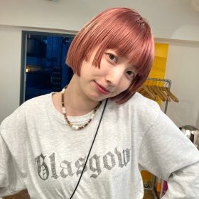 ピンク×ボブの女性